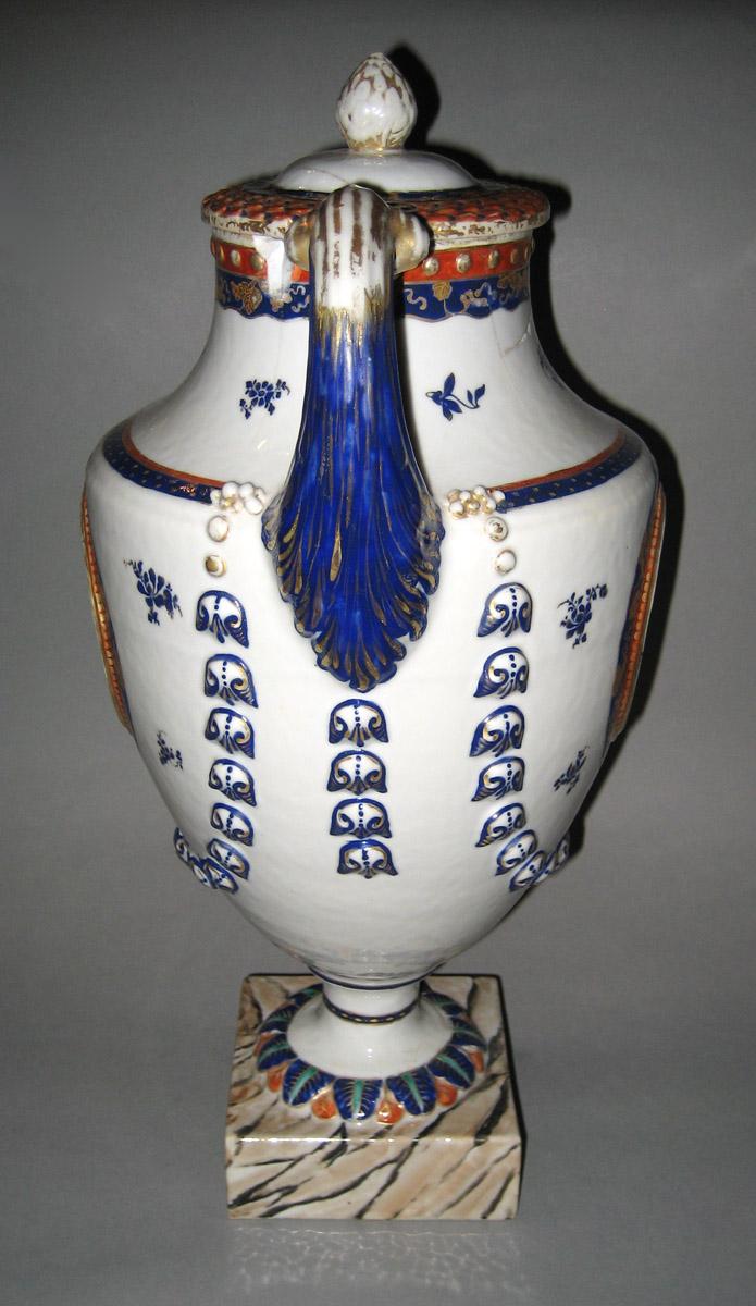 1961.0688.002 A, B Porcelain Urn and Cover side