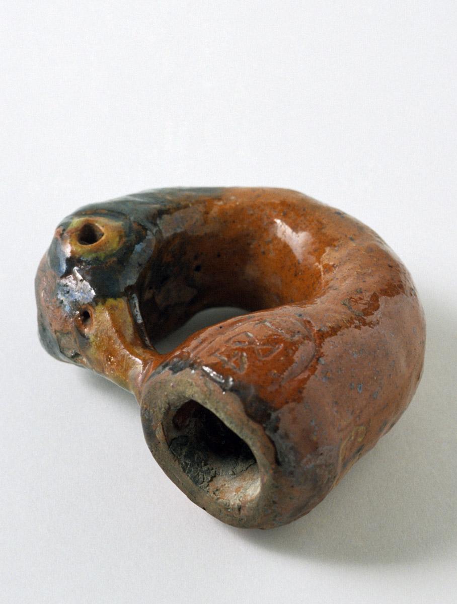 1952.0058 Redware bird cane handle