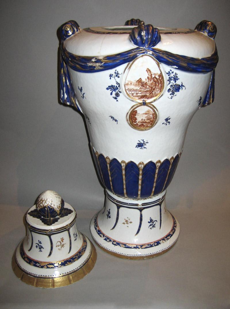 1961.0690 A, B Porcelain Urn and cover side overall