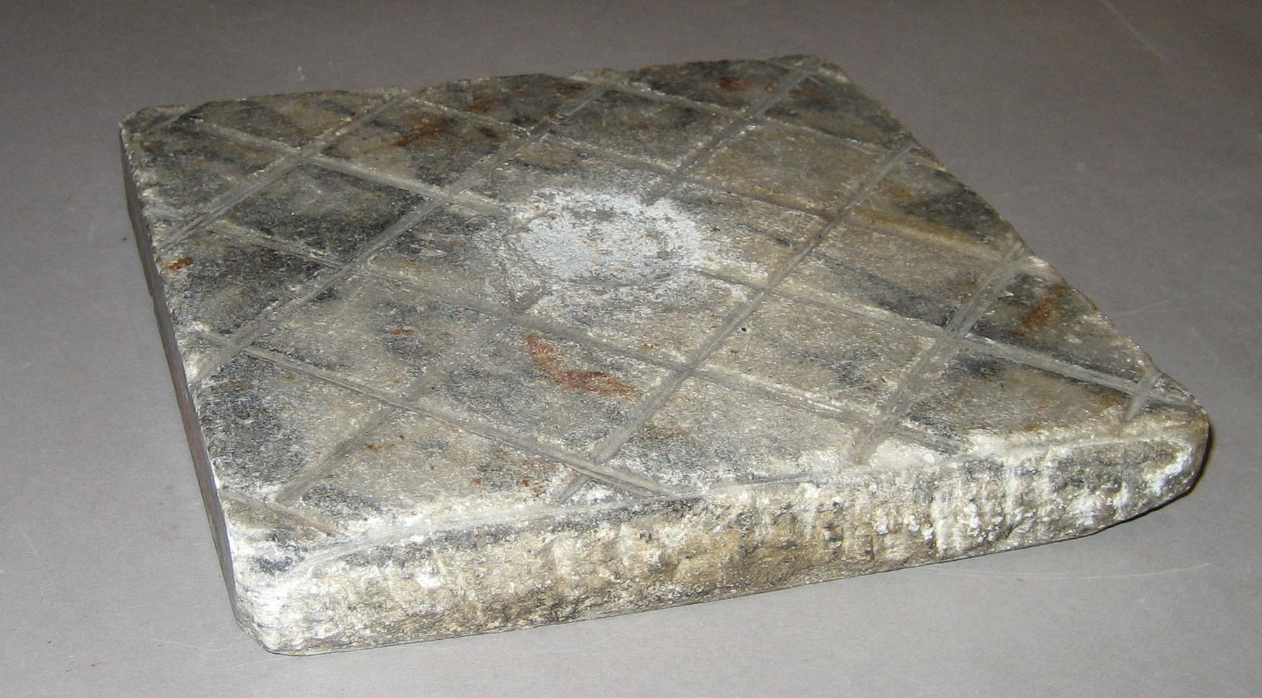 1961.0850.001 Tong stone