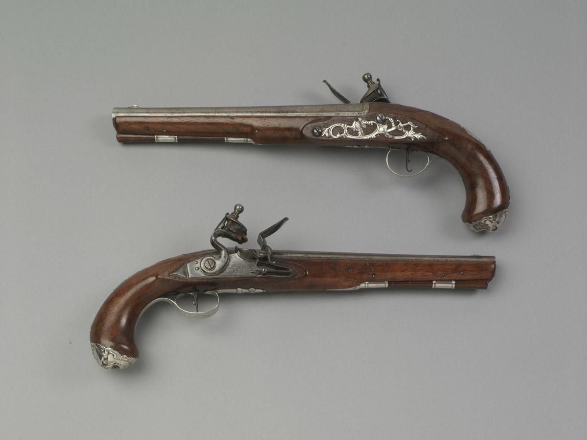 1961.0857.001, .002 Pistols
