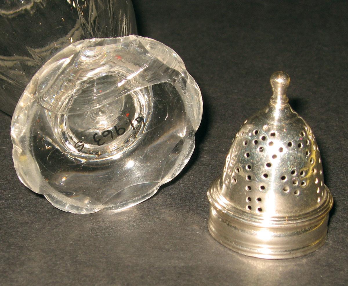 1961.0963 S Glass castor with silver cap (detail)