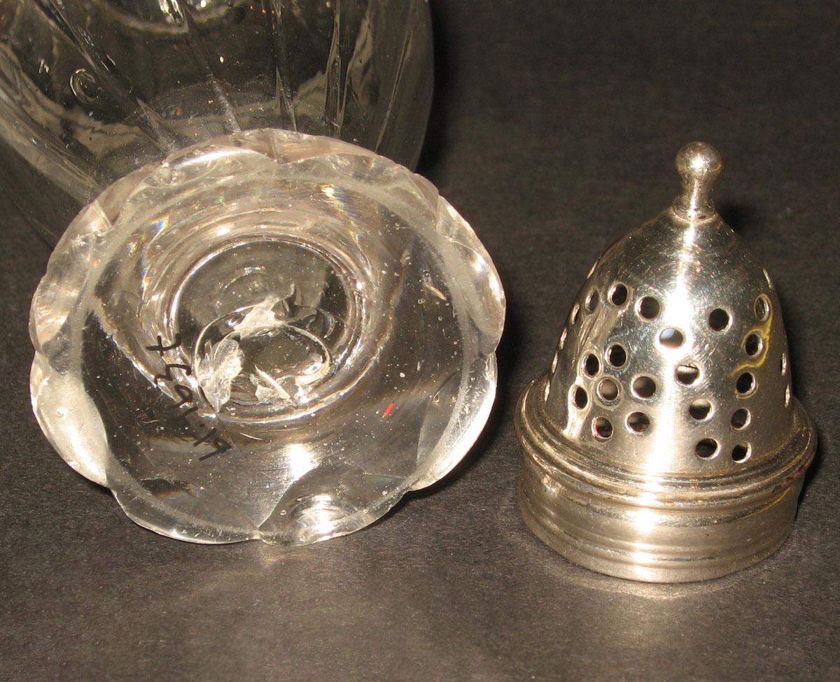 1961.0963 T (detail) Glass castor with silver cap