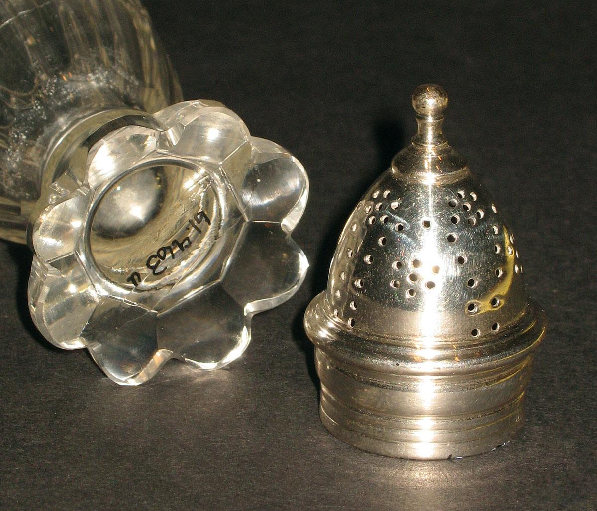 1961.0963 U Glass castor and silver cap (detail)