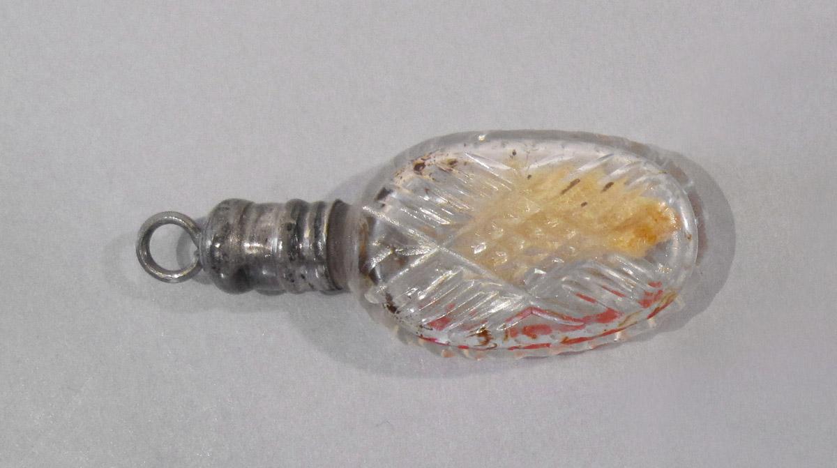1961.1026 K Bottle, side 1