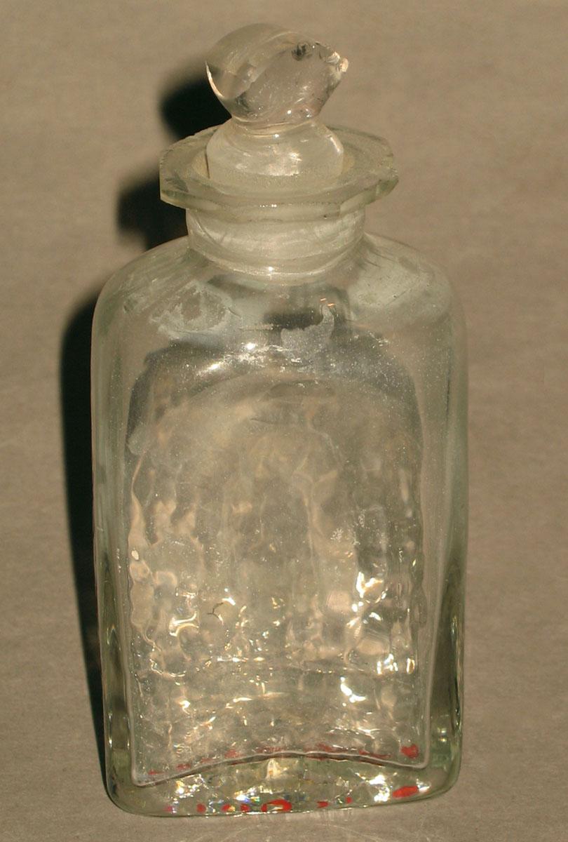 1961.1042 O Glass bottle