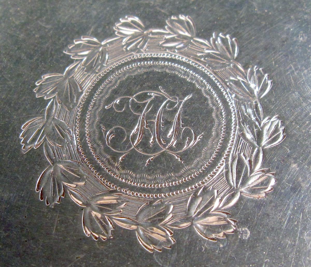 1961.1091 Silver Teapot stand engraving