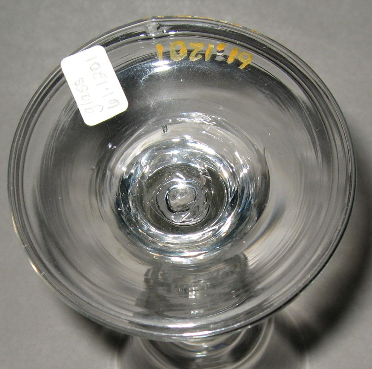 1961.1201 Colorless glass wine glass (underside)