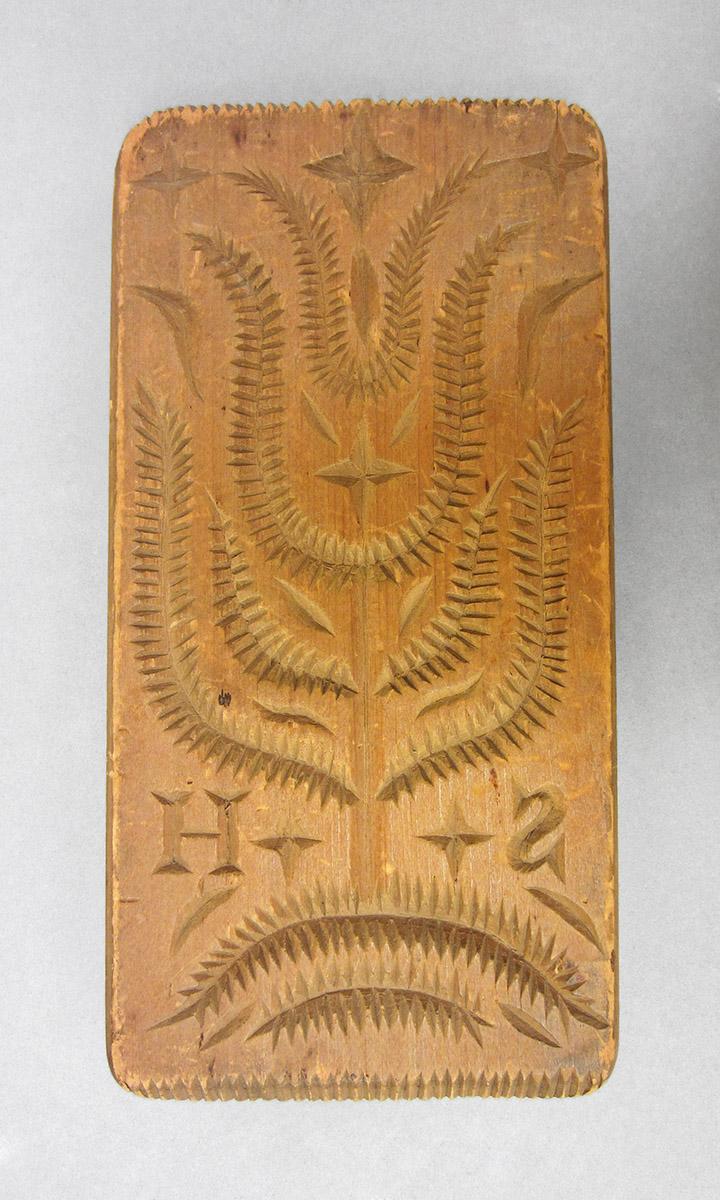 1961.1368, Butter mold, side 1