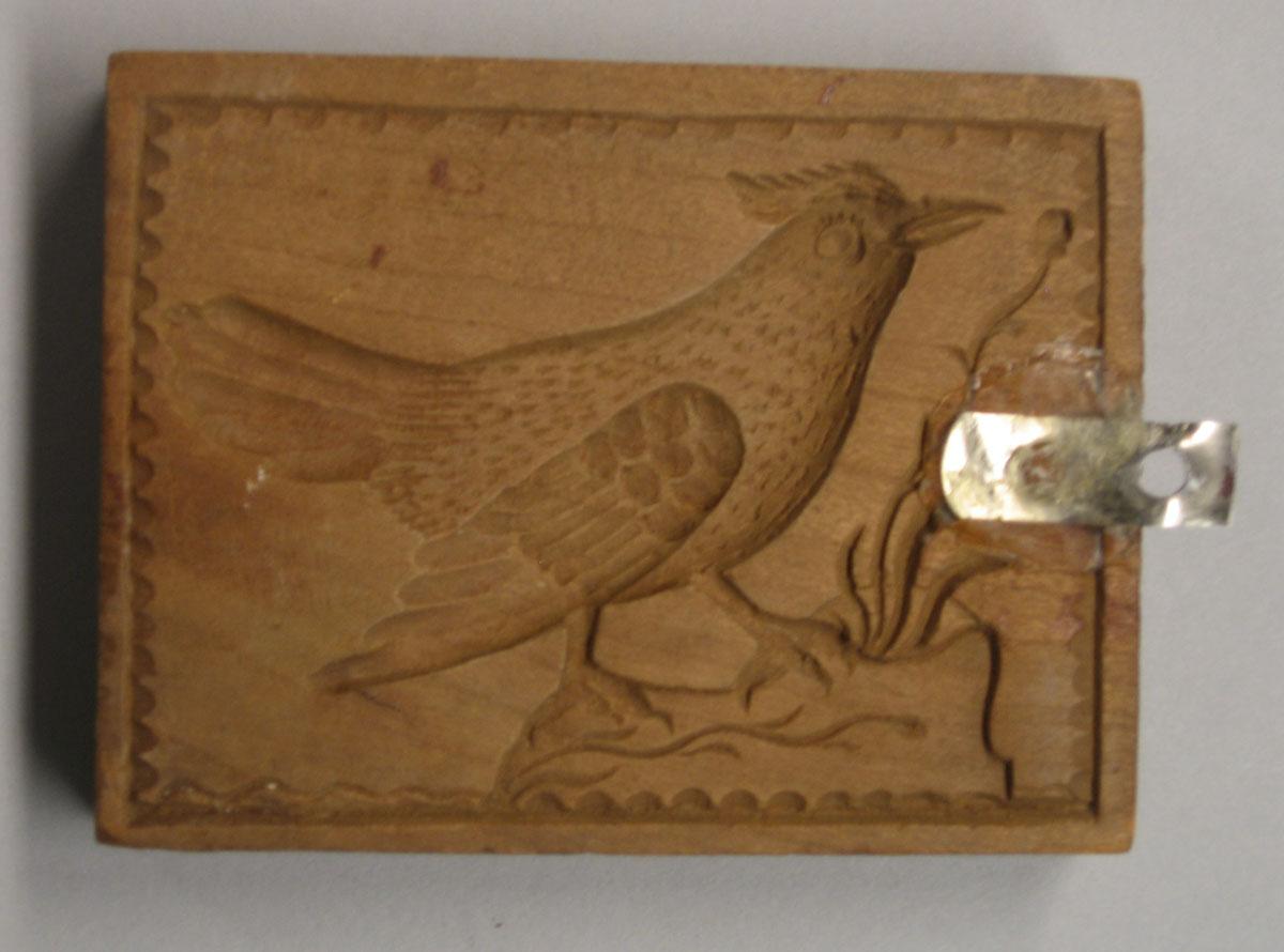 1961.1380 cookie stamp reverse