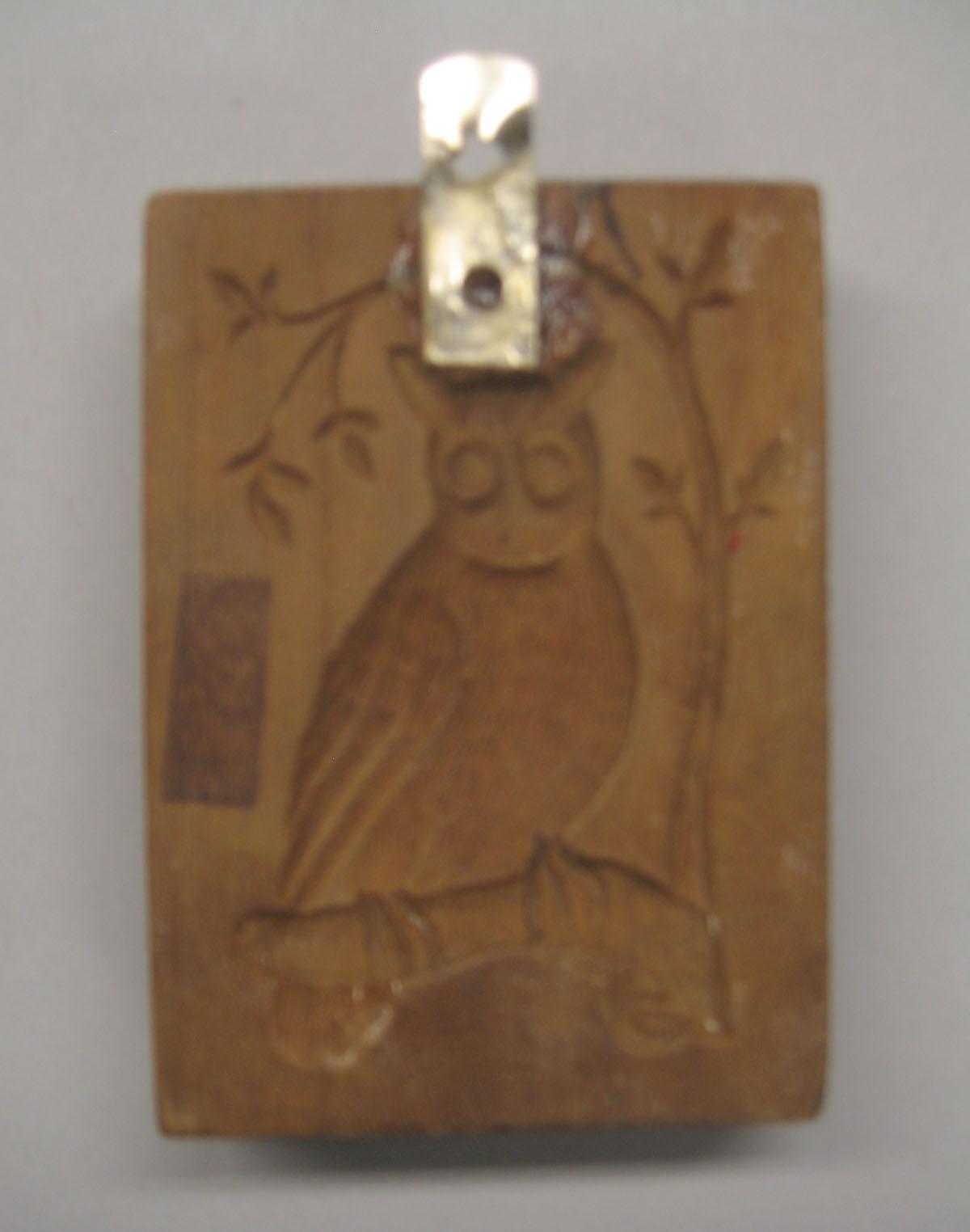 1961.1383 cookie stamp reverse