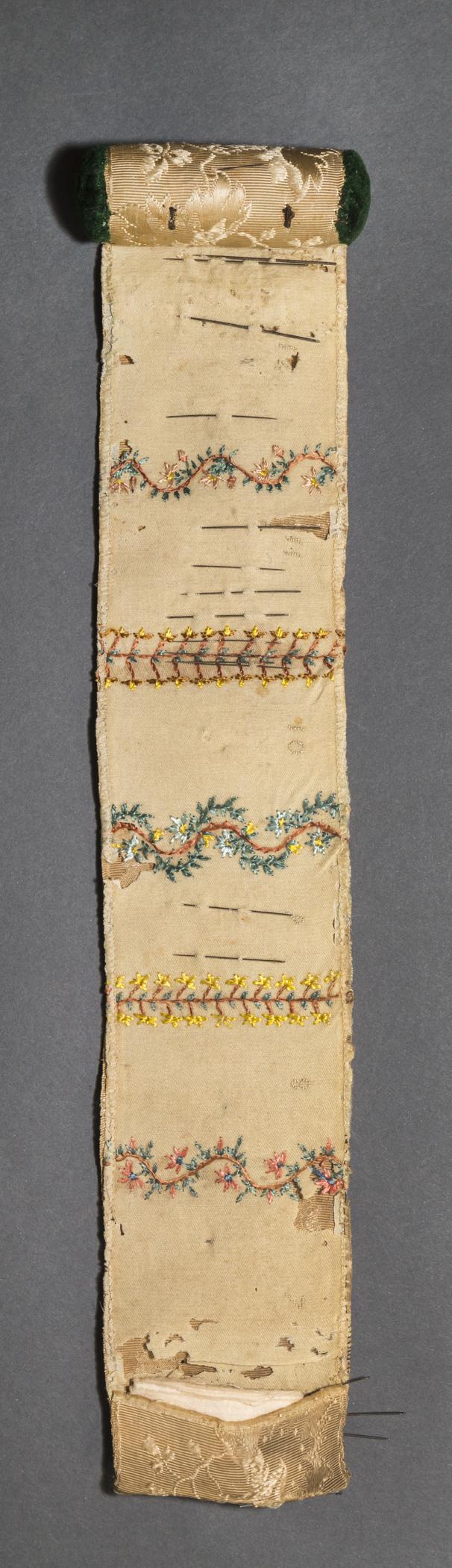 1961.1445 A Box contents, sewing roll, view 1