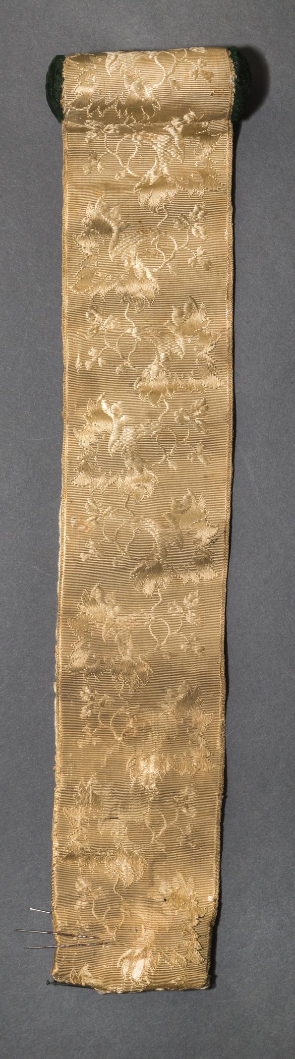 1961.1445 A Box contents, sewing roll, view 2, reverse