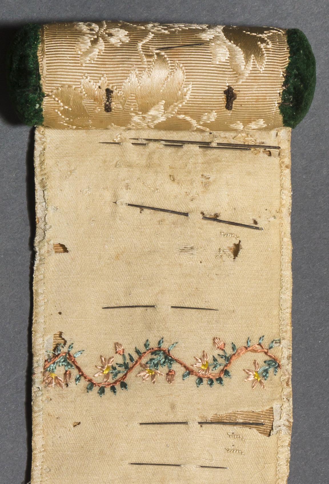 1961.1445 A Box contents, sewing roll, detail 1