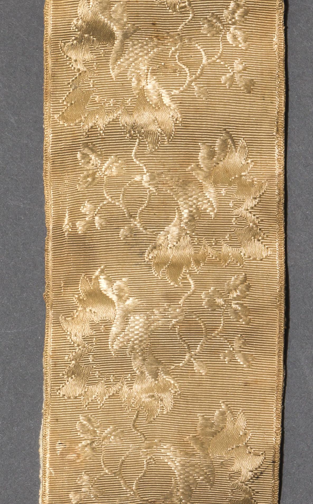 1961.1445 A Box contents, sewing roll, detail 1, reverse