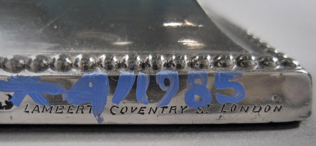 1961.1453 A Candlestick, inscription