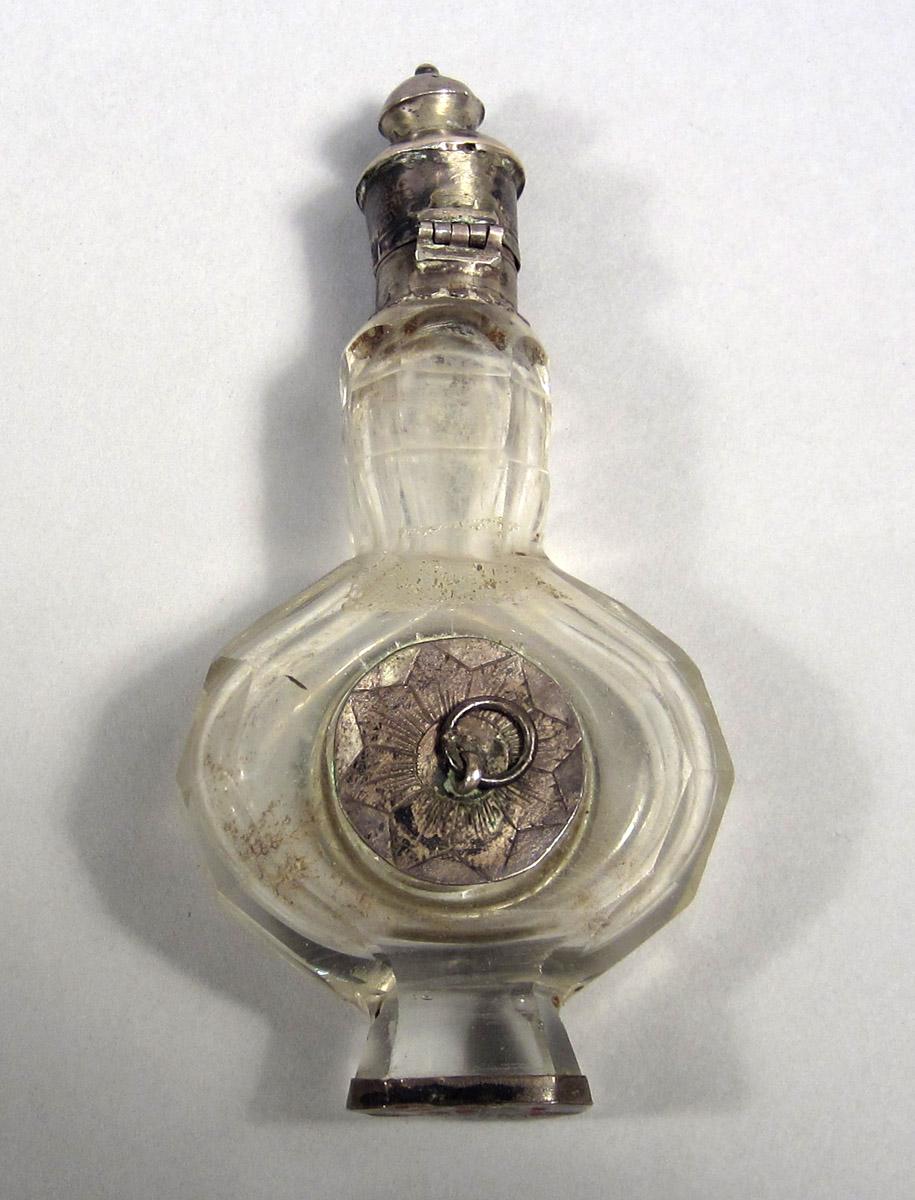 1961.1479 B Silver and Glass bottle