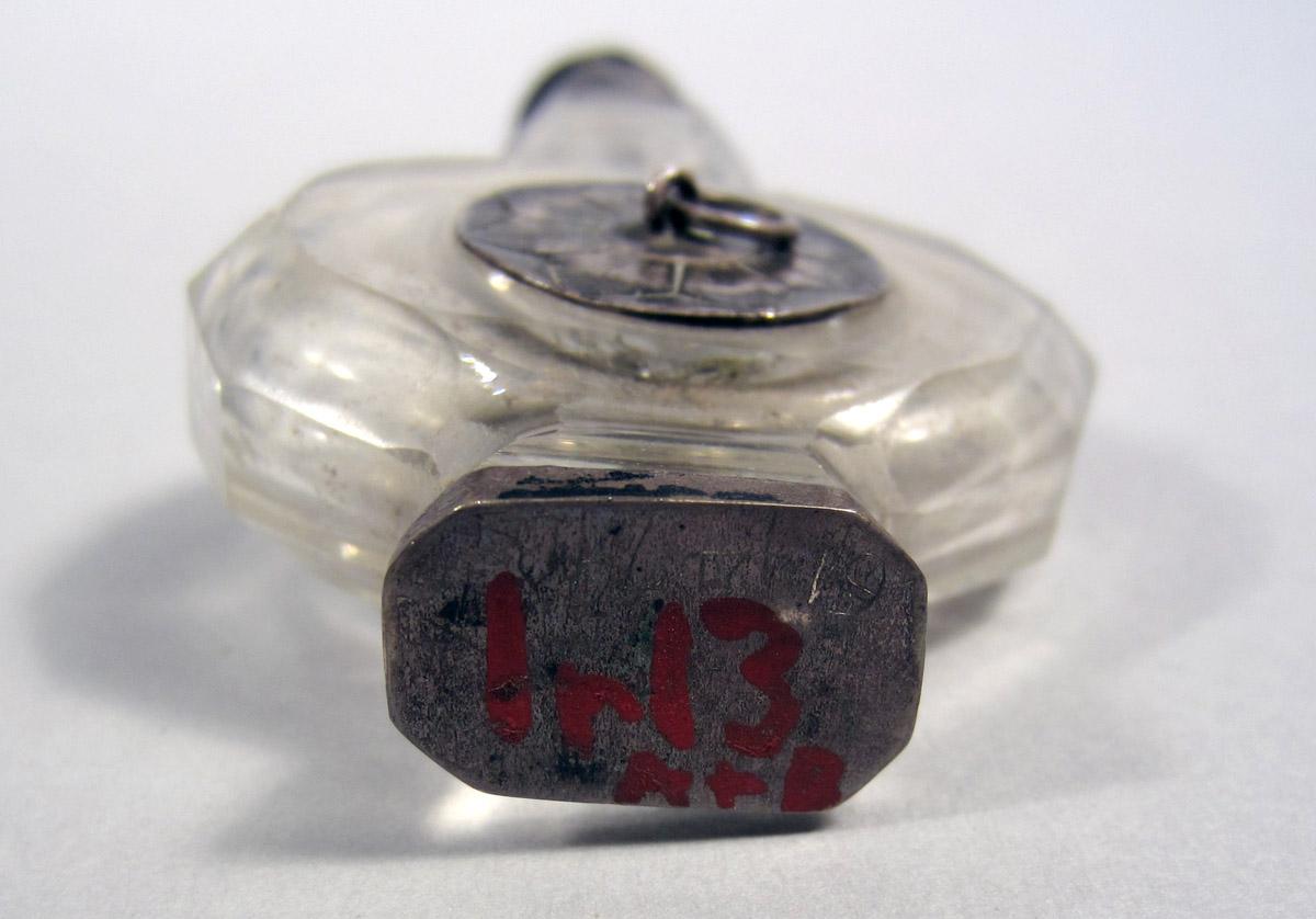 1961.1479 B Silver and Glass bottle underside and inscription