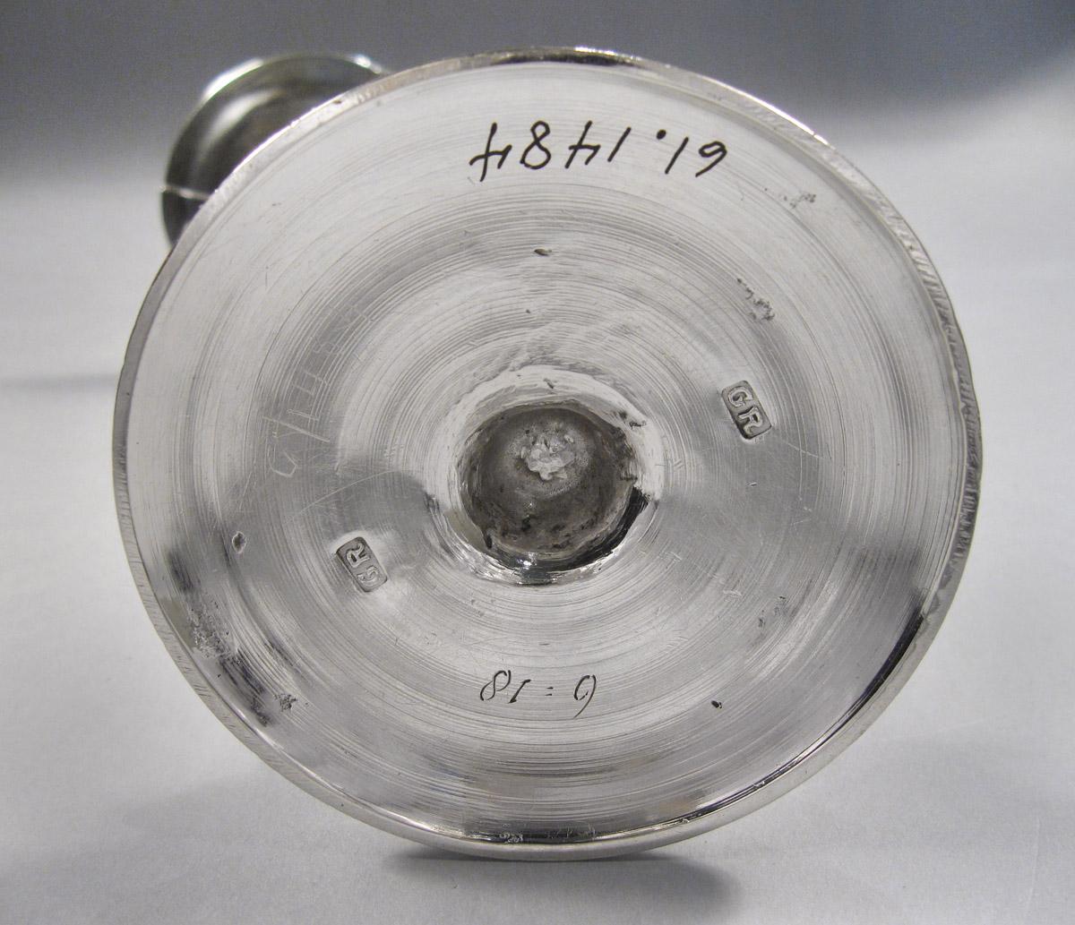 1961.1484 Taper stick, underside