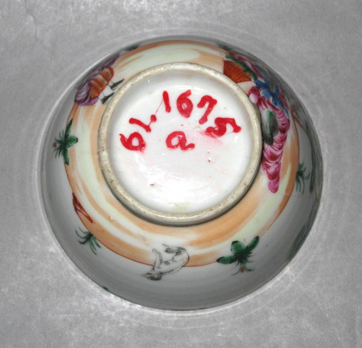 1961.1675 A Porcelain cup underside