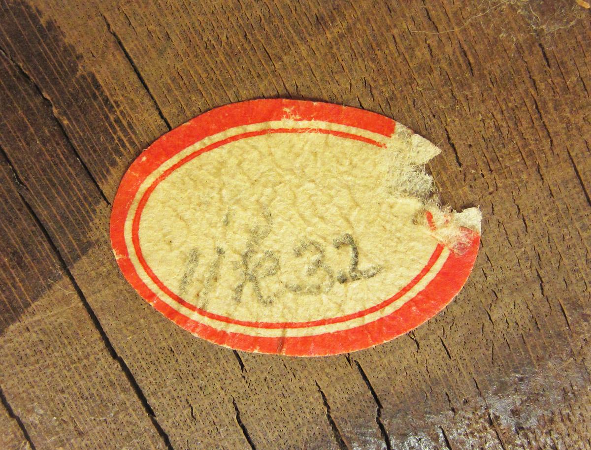 1961.1735, Butter mold, label 1