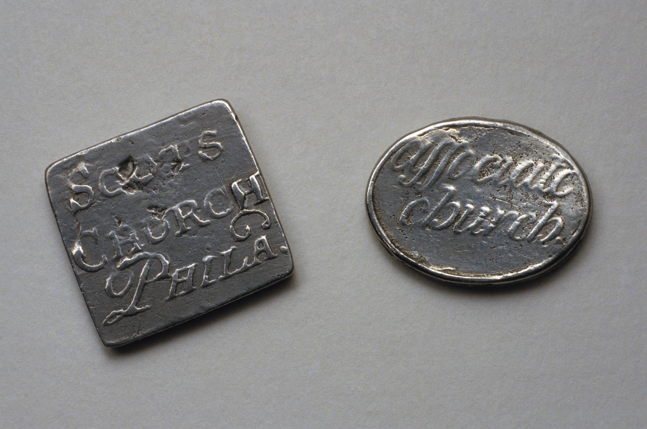 1962.0064, .0065 Pewter communion tokens