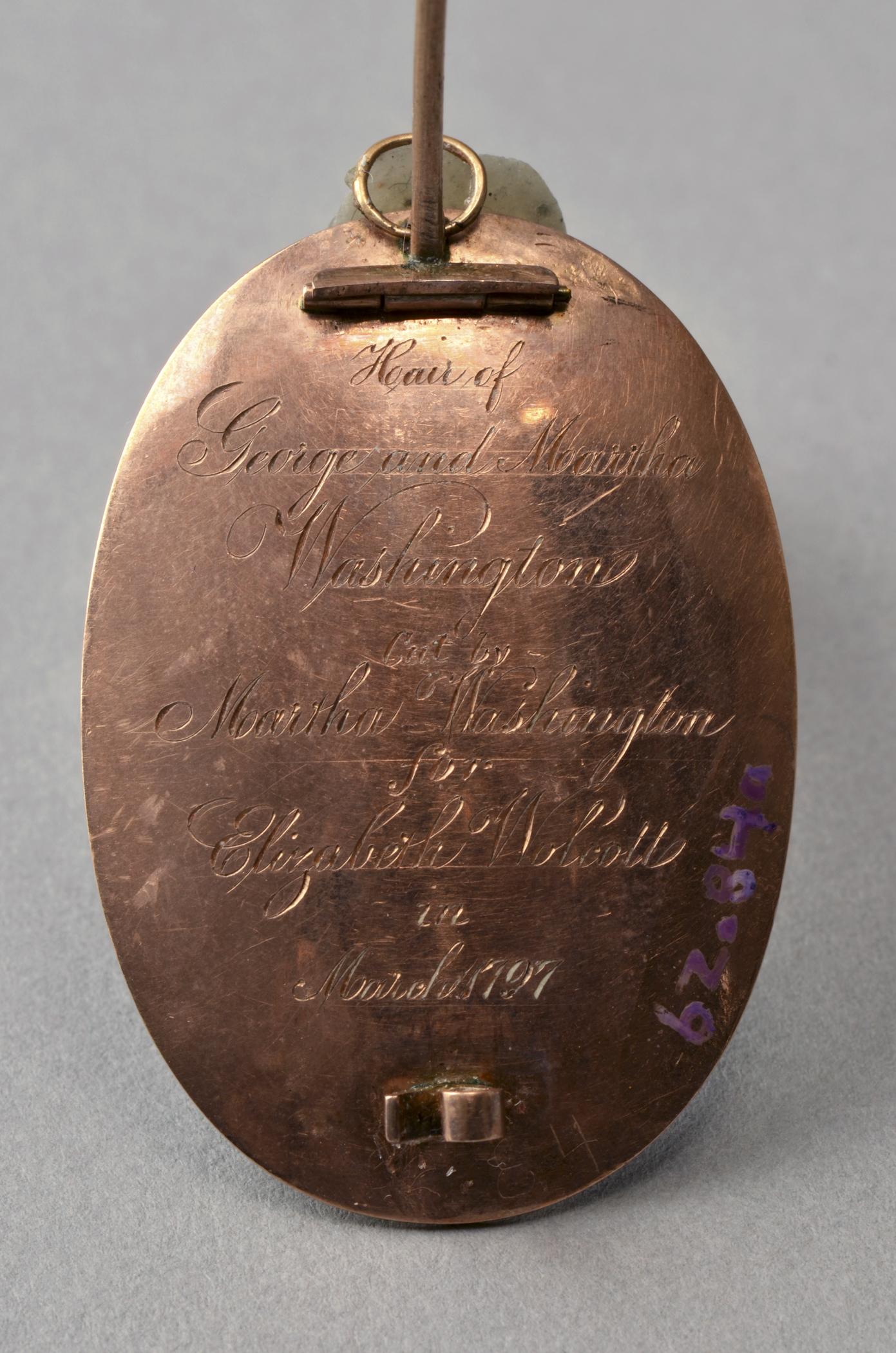 1962.0084 A Mourning brooch, view 2, reverse