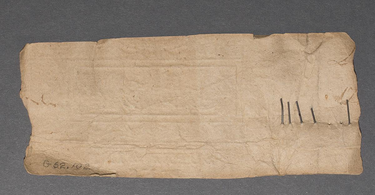 1962.0102 Pin Paper, Verso