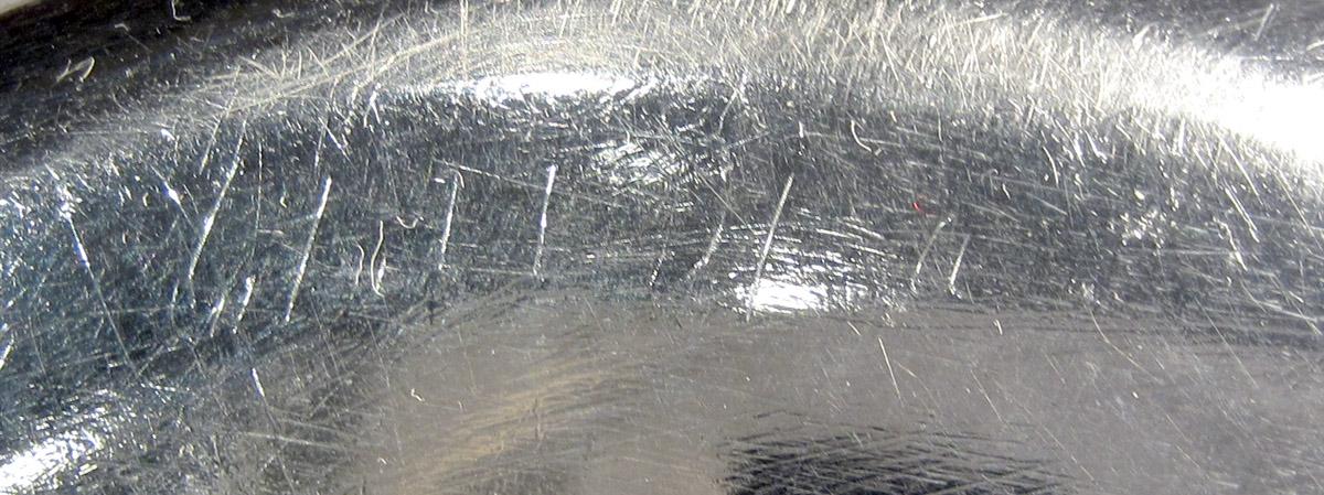 1955.0065.011 A Silver Candlestick inscription