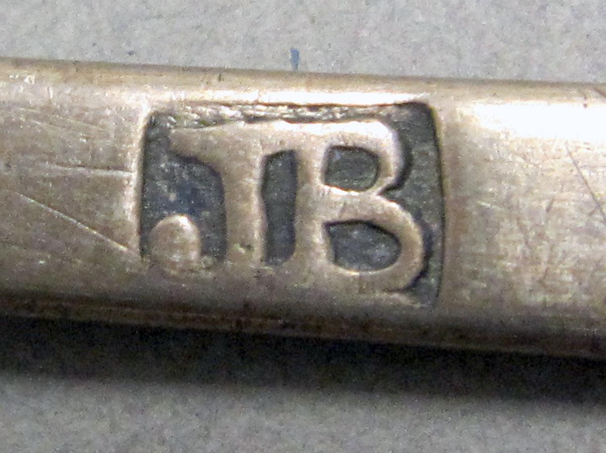 1962.0240.062 teaspoon mark