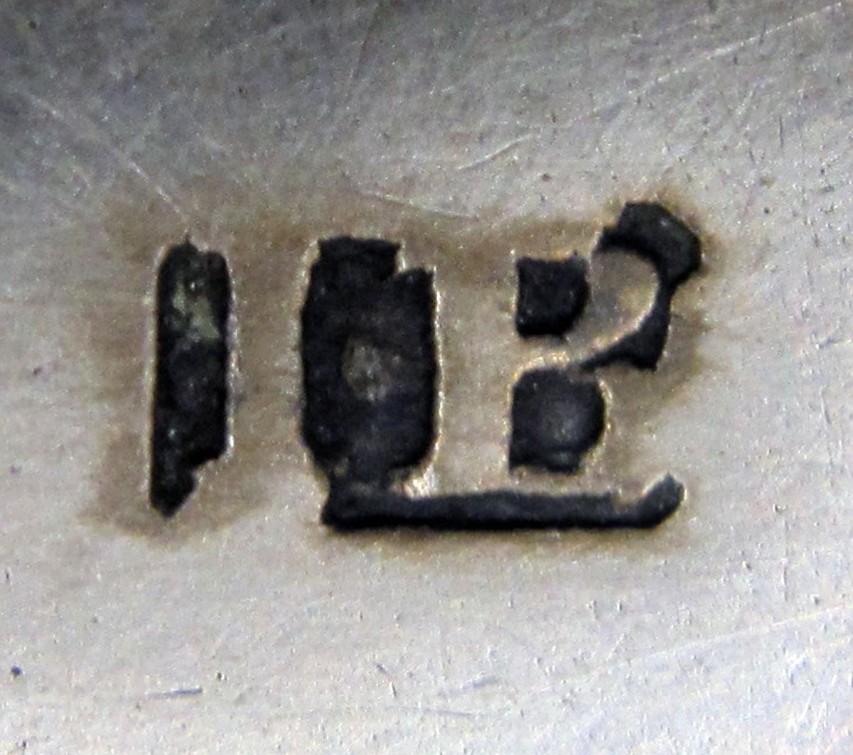 1962.0240.079 teaspoon mark