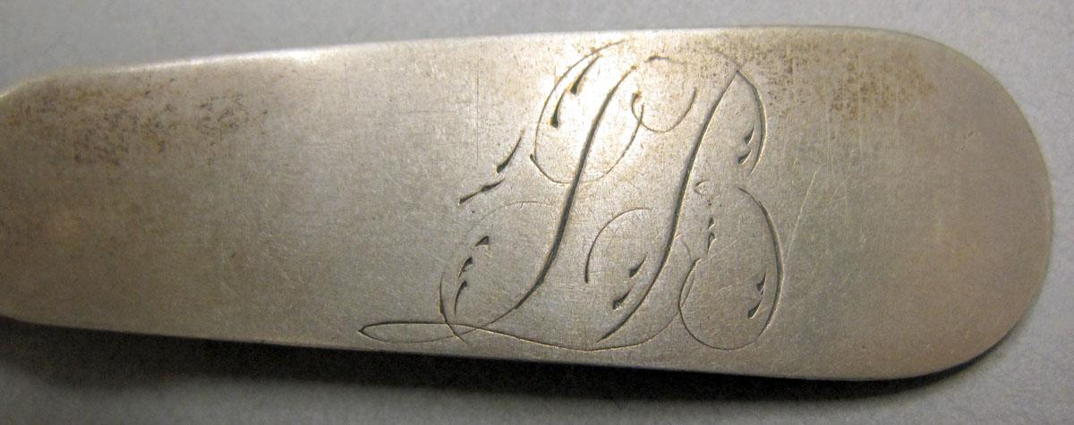 1962.0240.083 teaspoon engraving