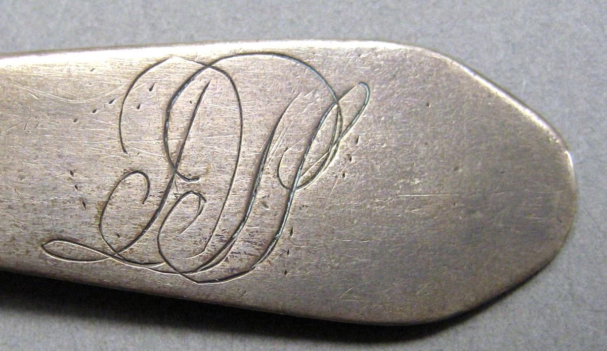 1962.0240.091 Silver Spoon engraving