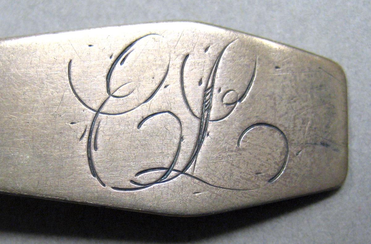 1962.0240.094 Silver Spoon engraving