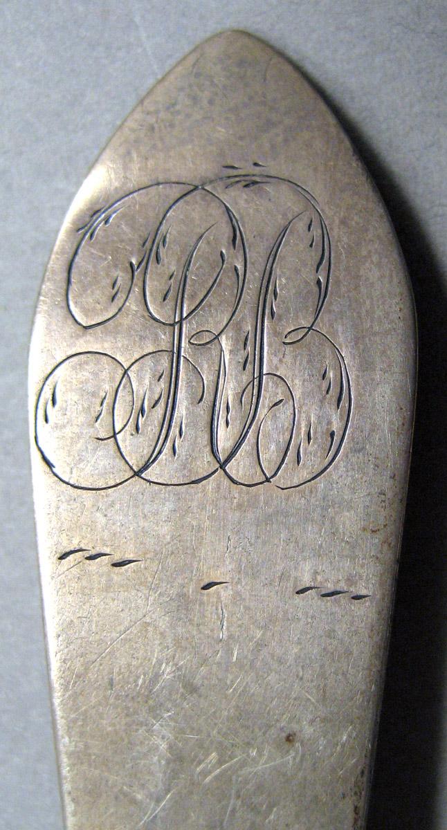 1962.0240.097 Silver Spoon engraving