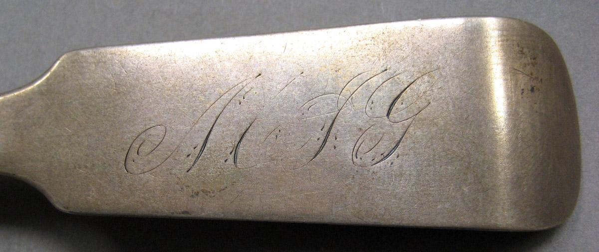 1962.0240.099 Silver Spoon engraving