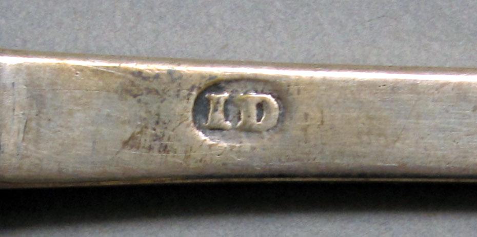 1962.0240.1038 Silver spoon mark