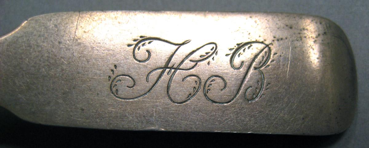 1962.0240.103 Silver Spoon engraving