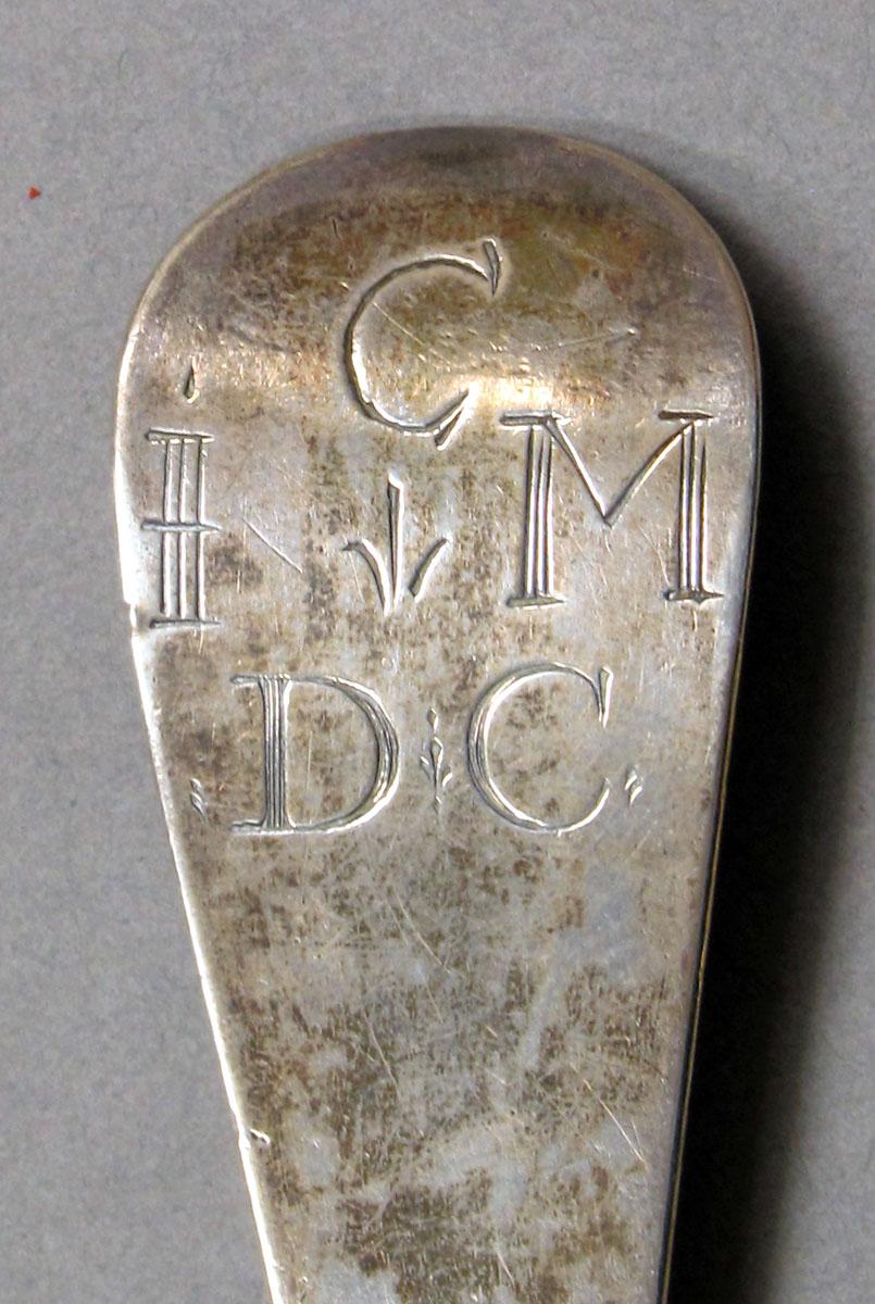 1962.0240.1041 Silver spoon engraving
