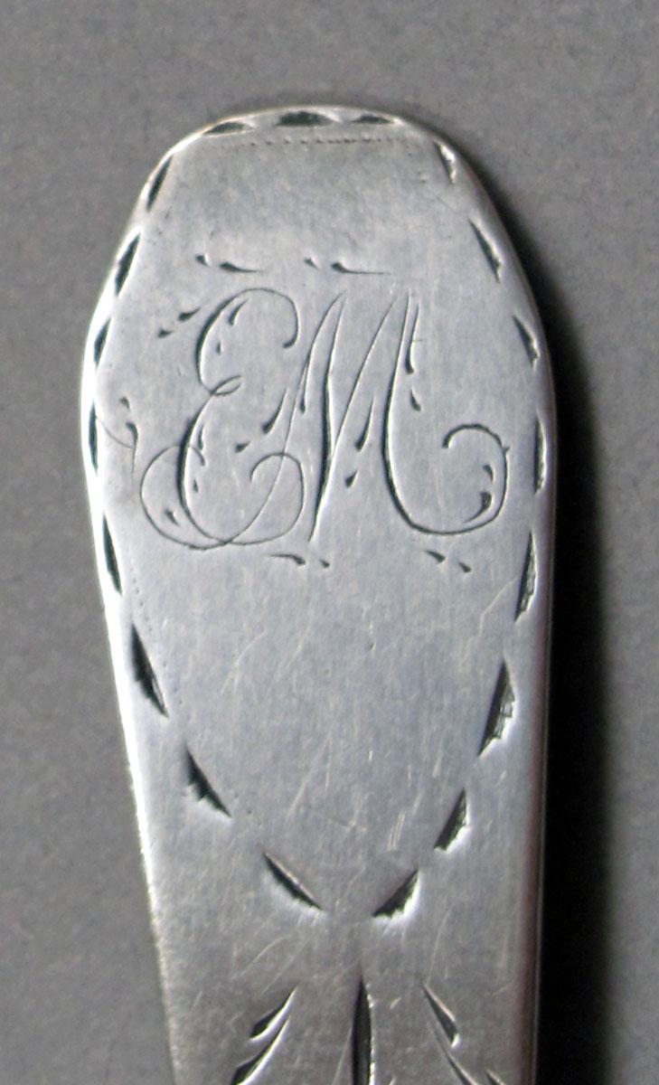1962.0240.1047 Silver spoon engraving