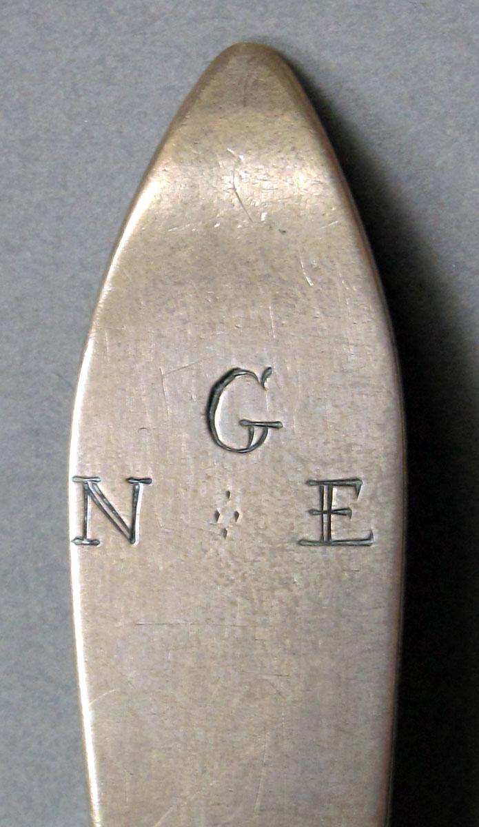 1962.0240.1065 Silver spoon engraving