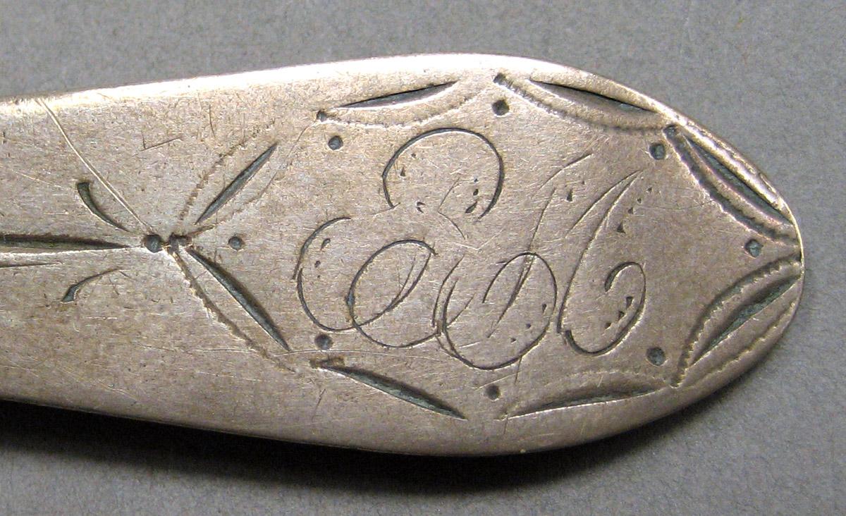 1962.0240.106 Silver Spoon engraving