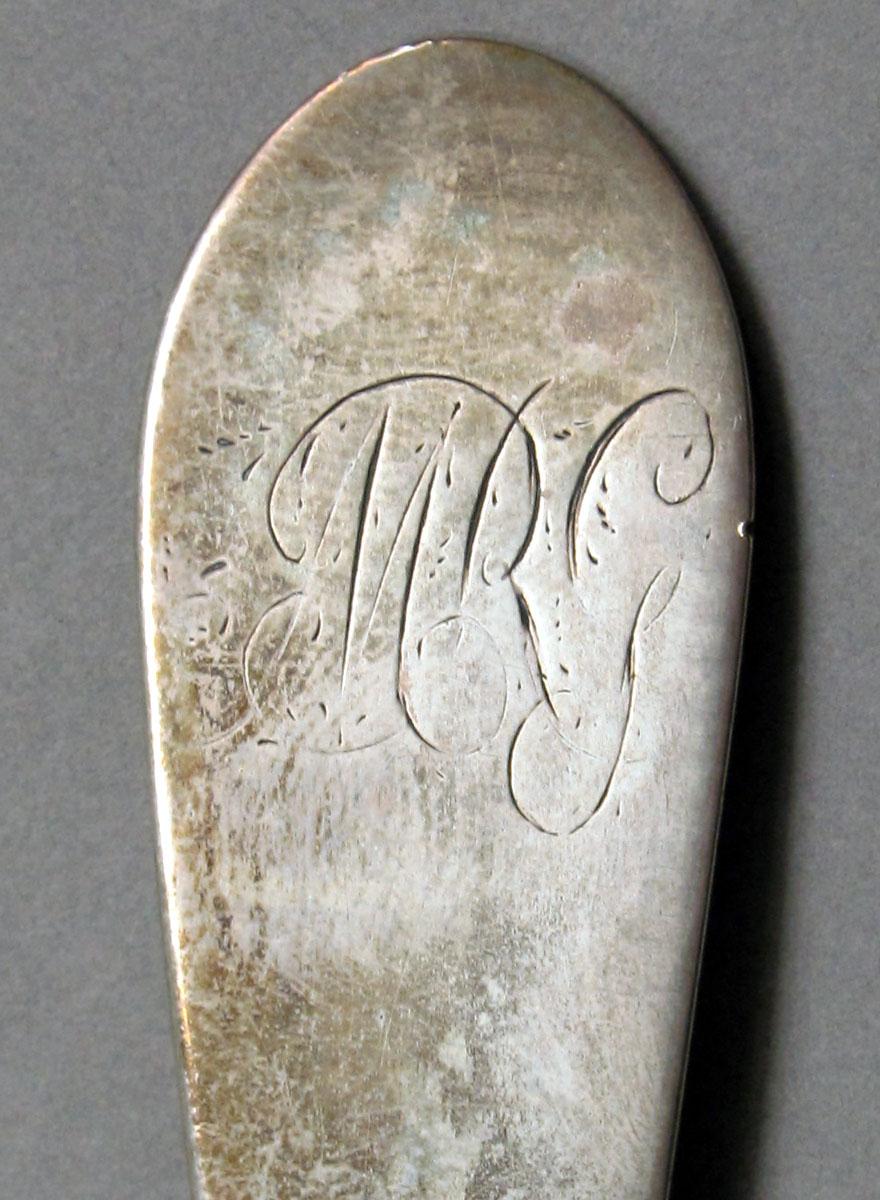 1962.0240.1070 Silver spoon engraving