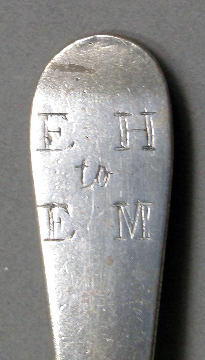 1962.0240.1071 Silver spoon engraving
