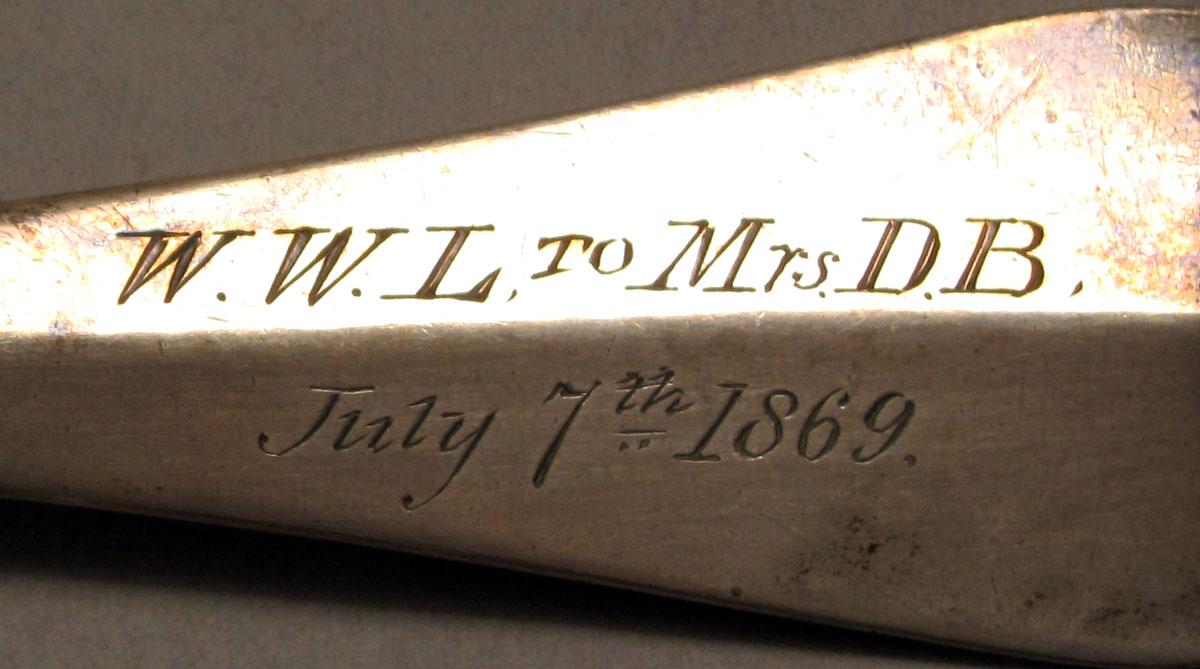 1962.0240.1077 Silver spoon engraving 1