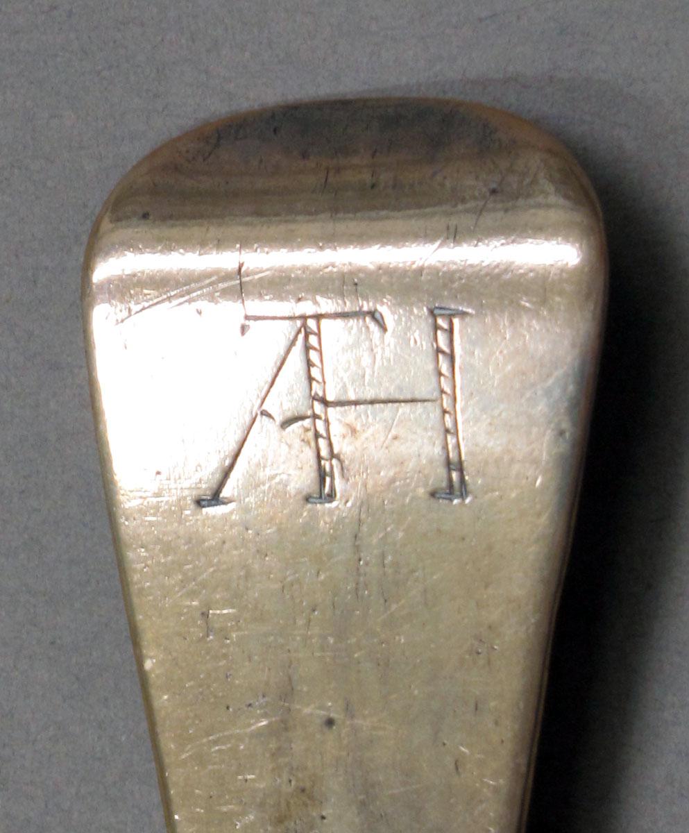 1962.0240.1078 Silver spoon engraving