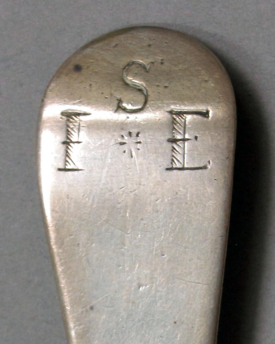 1962.0240.1080 Silver spoon engraving