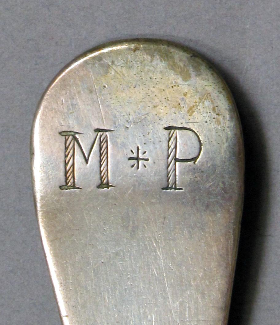 1962.0240.1083 Silver spoon engraving