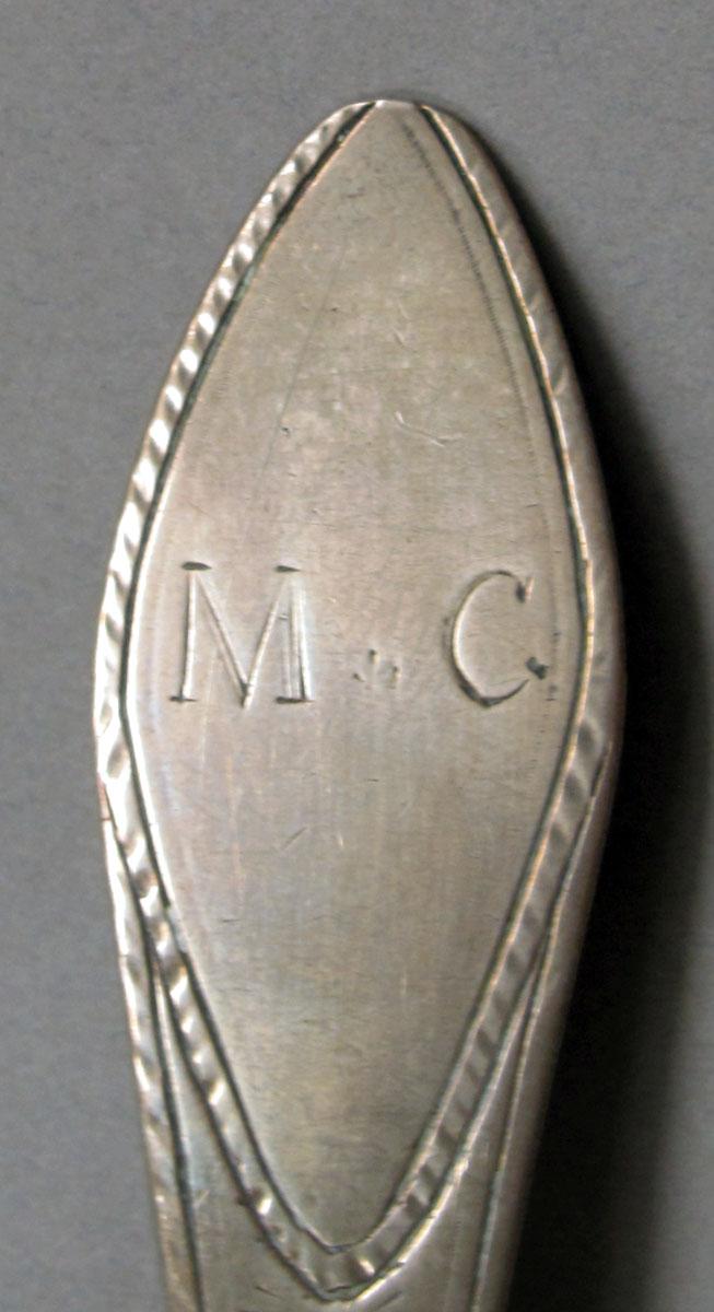 1962.0240.1089 Silver spoon engraving