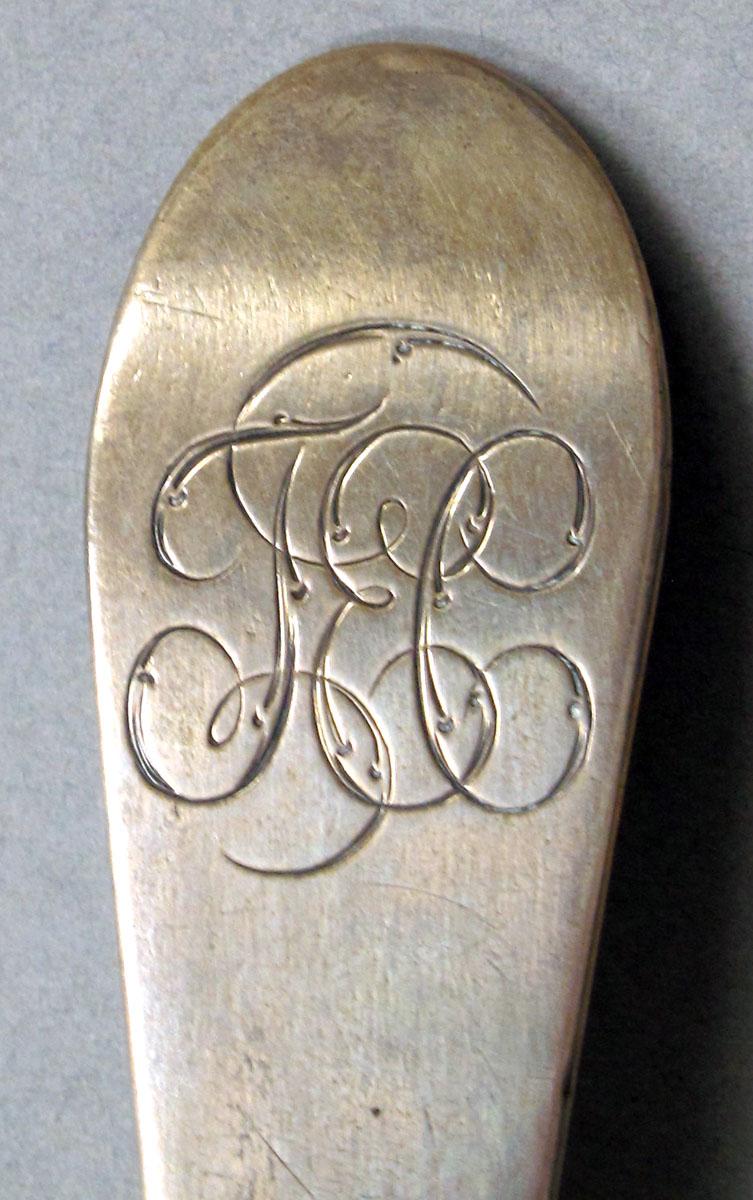 1962.0240.1090 Silver spoon engraving